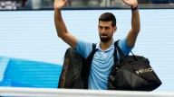 Novak Djokovic overcomes humidity and injury to advance into Shanghai Masters quarter