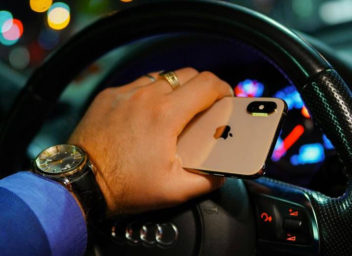 Can You Be Ticketed for Holding Your Phone While Driving?