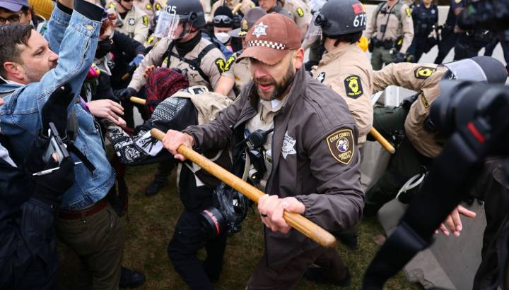 Scuffle breaks out between demonstrators, state and sheriff's police outside Broadview ICE facility