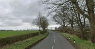Motorbike rider airlifted to hospital following three-vehicle collision on country lane