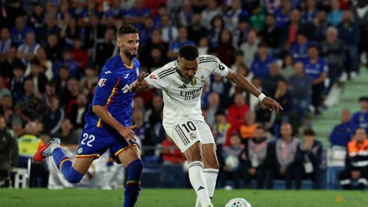 Mbappe scores again to send Real top in nervy 1