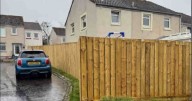 Midlothian garden fence slammed as 'undesirable' as owner facing order to tear it down