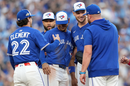 Hat trick: The Blue Jays think their 1992 World Series-style caps are a lucky charm