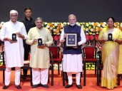 Modi puts RSS on national currency, ends speculation of distance