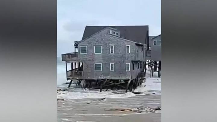 Bermuda lashed by distant hurricane and prepares for the stronger Imelda