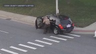 Police officer saves woman who began choking while driving