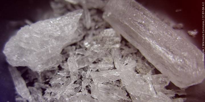 Police respond to report of man passed out, found with drugs in his possession