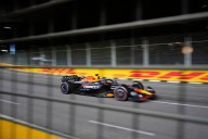 George Russell wins F1's Singapore GP as McLaren secures constructors' title