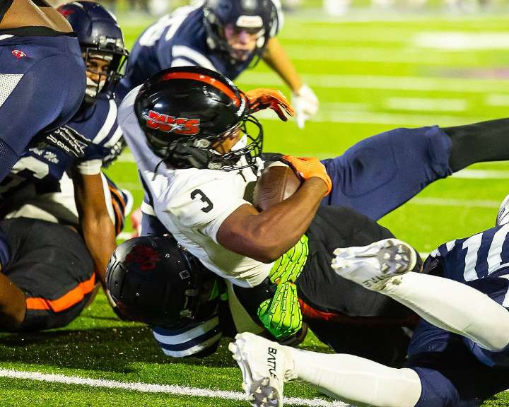 Bucs' defense delivers knockout blows in region win over Oak Mountain