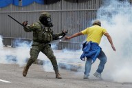 Demonstrators in Ecuador clash with police amid strike over fuel prices