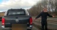 Moment raging driver slams on brakes and stops on M40 during stand