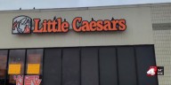 Closed signs appear at Little Caesars in central Nebraska