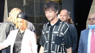 Louis Tomlinson outs himself as unnamed celebrity who refused photos on Robbie Williams flight