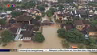 Vietnam flood death toll rises to 13, with 11 others missing