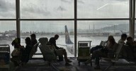 Cargo plane slides off runway in Hong Kong