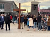 Hundreds unite at Grand Blanc High School vigil after deadly church attack