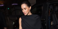 Meghan Markle Wears Elegant Black Dress With a Cape During Paris Fashion Week | Meghan Markle 