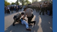 Noem visits Chicago area ICE facility as agents detain multiple protesters outside