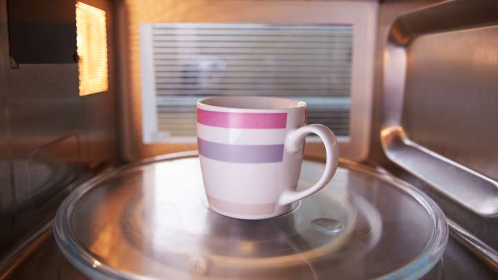 Stop Reheating Cold Coffee In The Microwave And Use This Gadget Instead