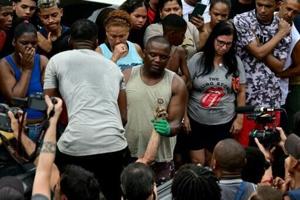 ‘They slit my son’s throat’ says mother of teen killed in Rio police raid