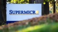 Stocks making the biggest moves midday: SMCI KNX WH LVS