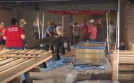 Local couple and volunteers build and supply beds to those in need