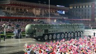 Kim Jong Un shows off new ballistic missile at Pyongyang military parade