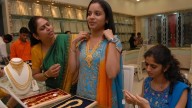 Gold prices cool from record highs ahead of festive season, should you buy now in dips?