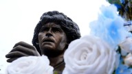 Maradona statue rides through Naples as city remembers Argentine great