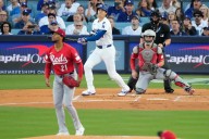 Cincinnati Reds fall 10-5 to the Los Angeles Dodgers in Game 1