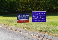 Candidate signs start to appear with one month before election