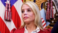 Pam Bondi's Painfully Awkward Pics Prove She Needs A Lesson In Posing