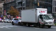 NYC truck hits parked van, pushing it onto sidewalk and injuring 9