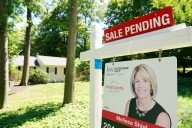 Home sales hit 7-month high as falling mortgage rates tempt buyers