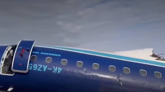 Putin says Russian air defenses were responsible for downing an Azerbaijani jetliner last year that killed 38 people