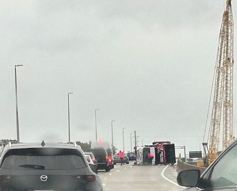 Overturned truck on I-64 W causes delays, lane closures