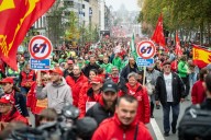 Belgian police fire tear gas as thousands protest austerity measures