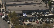 Woman arrested for murder after police find body in South LA tow yard