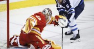 Scheifele scores late as Jets burn Flames 2