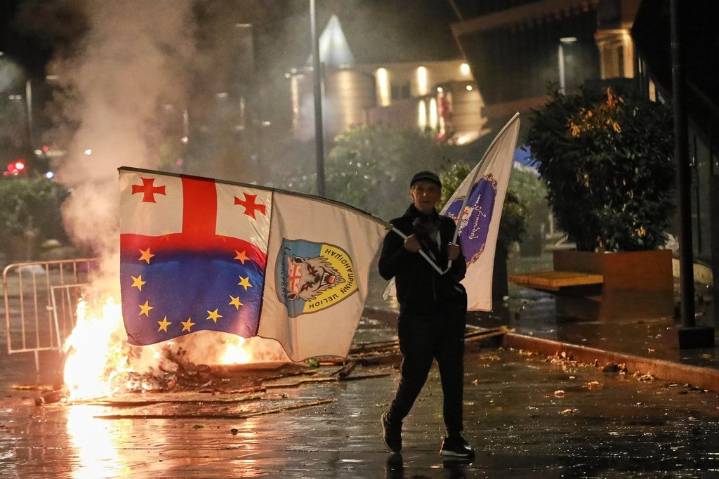 Georgia’s ruling party claims landslide win in local vote boycotted by main opposition
