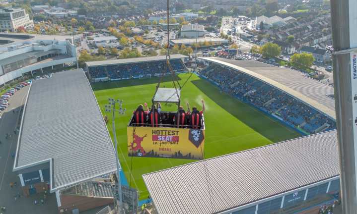 Fans ride giant crane to watch EFL match with alcohol for first time in 40 years