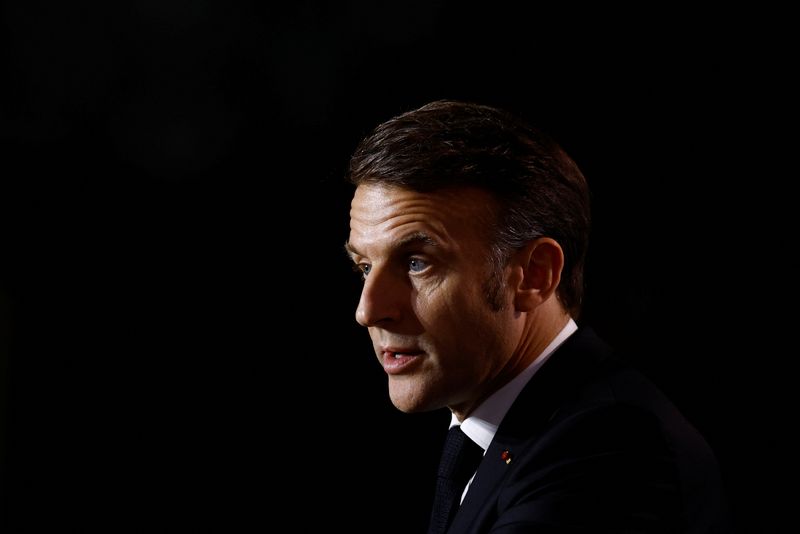 Macron wanders alone by the Seine as grip on his future slips away