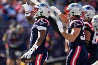 Patriots running back suffers knee injury on heavy hit in Bills game