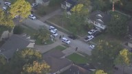 Man found fatally shout outside Katy home; one detained