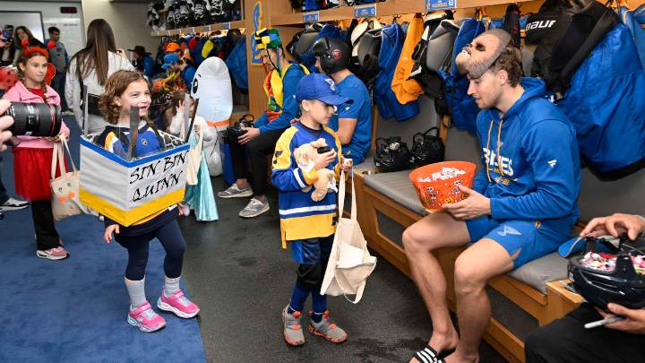 Blues trick-or-treat with patients from St. Louis Children’s Hospital