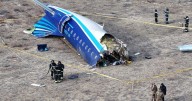 Putin says Russian air defenses shot down Azerbaijani jet's crash last year, killing 38
