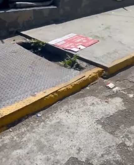 Tanquilla destapada frente al Periférico es un peligro