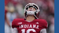 The Latest: BYU cracks the top 10 of the AP Top 25, LSU drops out