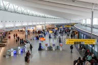 LaGuardia, Newark, & JFK Flights Grounded Amid NYC’s Weather Alert — Heavy Rain & Gusts of Wind Up To 50 MPH