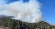 Firefighters battle wildfire west of Plains